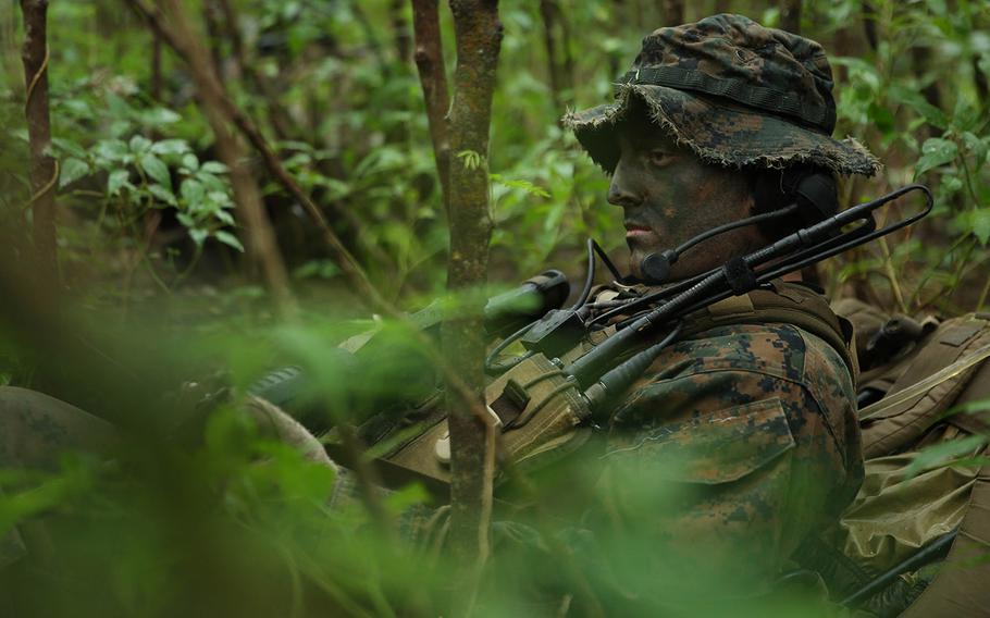 Corporal Scott Hunt, from Palm Bay, Fla., and pointman with Company A, 1st Reconnaissance Battalion, 1st Marine Division, rests during reconnaissance and surveillance training, Nov. 19-21, 2015, at Marine Corps Training Area Bellows, Hawaii.