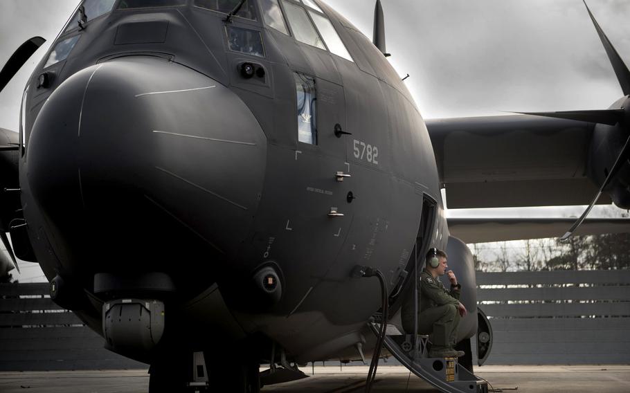 Senior Airman Kevin O?Neil, a 71st Rescue Squadron loadmaster, waits for engine startup Dec. 11, 2015, at a Lockheed Martin Corp. C-130 ramp in Marietta, Ga. The HC-130J Combat King II is the 2,500th C-130 manufactured by Lockheed Martin and the seventh HC-130J the 71st RQS has received.