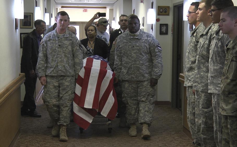 Soldiers with the 3rd Armored Brigade Combat Team, 1st Cavalry Division participate in a ceremony for a veteran who passed away at the William R. Courtney Texas State Veterans Home, Dec. 18, 2015, at Temple, Texas.