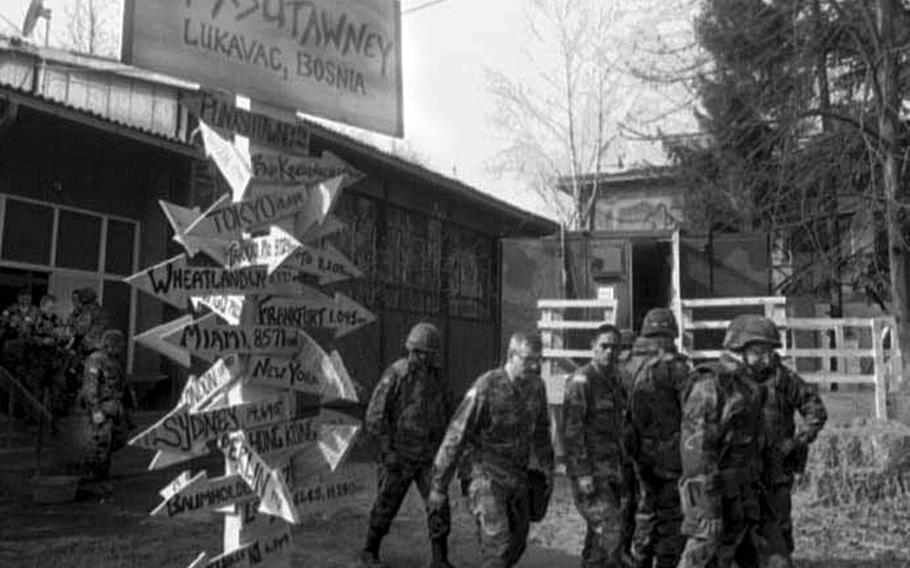 A new sign post in February 1996 proclaims Lukavac base camp in Bosnia-Herzegovina as Camp Punxsutawney, a reference to the movie Groundhog Day because every day seemed the same.