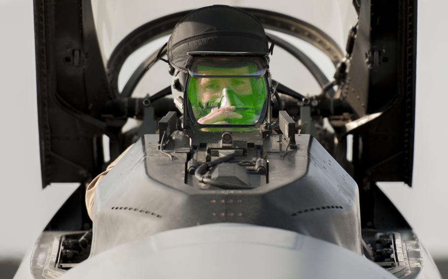 First Lt. Matthew Sanders, 421st Expeditionary Fighter Squadron pilot, prepares for a combat sortie in an F-16 Fighting Falcon at Bagram Air Field, Afghanistan, on Sunday, Jan. 17, 2016.