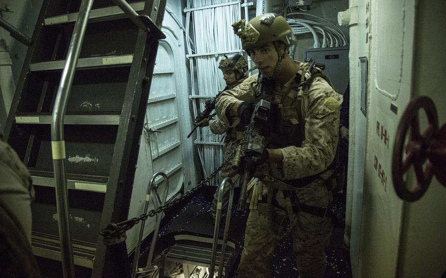 U.S. Marines with the Maritime Raid Force, 13th Marine Expeditionary Unit, conduct drills while aboard the USS Boxer during a sustainment exercise off the coast of southern California, Jan. 17, 2016.