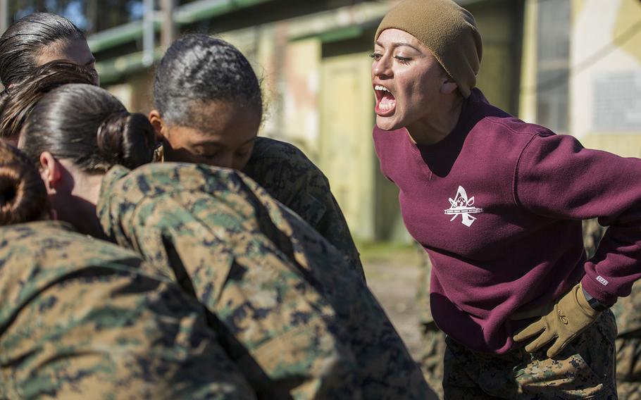 U.S. Marine Staff Sgt. Paulina Alvarado, Platoon 4008, Company O, 4th Recruit Training Battalion, encourages recruits to clean their gas masks faster Jan. 19, 2016, at Parris Island, S.C.
