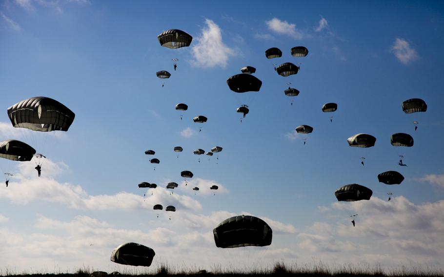 U.S. Army paratroops with the 82nd Airborne jump out of an Air Force C-130 for the Saturday Proficiency Jump Program at Pope Army Airfield at Fort Bragg, N.C., Jan. 16, 2016.