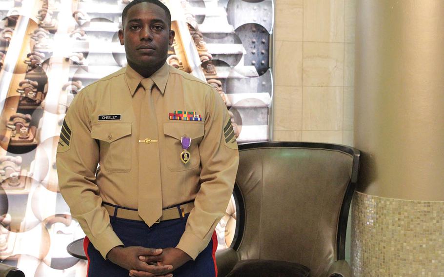 U.S. Marine Sgt. DeMonte R. Cheeley stands for a photo after receiving the Purple Heart medal Jan. 26, 2016, at a ceremony in Chattanooga, Tenn. Cheeley received the Purple Heart for injuries he sustained during a July 16, 2015, attack in Chattanooga at the Armed Forces Career Center where he works.