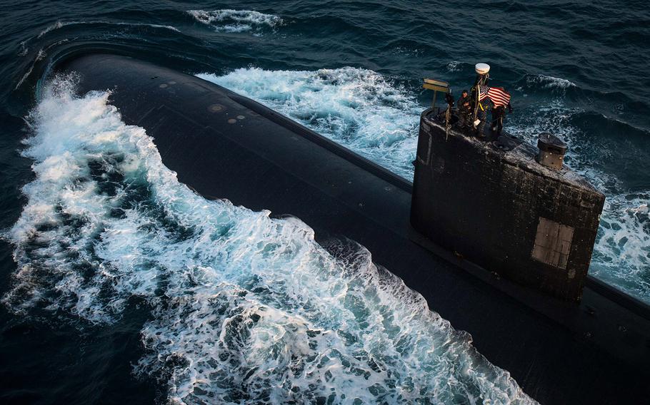 The Los Angeles-class fast attack submarine USS Toledo, assigned to Commander, Task Force 54, transits through the Arabian Gulf Jan 21, 2016.