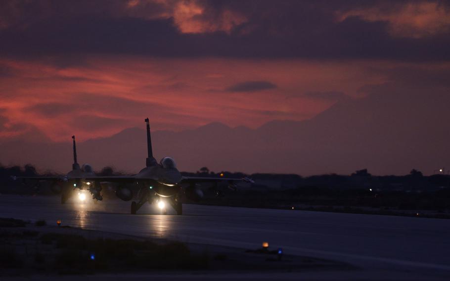 U.S. Air Force pilots from the 480th Expeditionary Fighter Squadron taxi F-16 Fighting Falcon fighters during a flying training deployment on the flight line at Souda Bay, Greece, Jan. 28, 2016. This training is the fourth of its kind between the U.S. and Greek air forces since January 2014.
