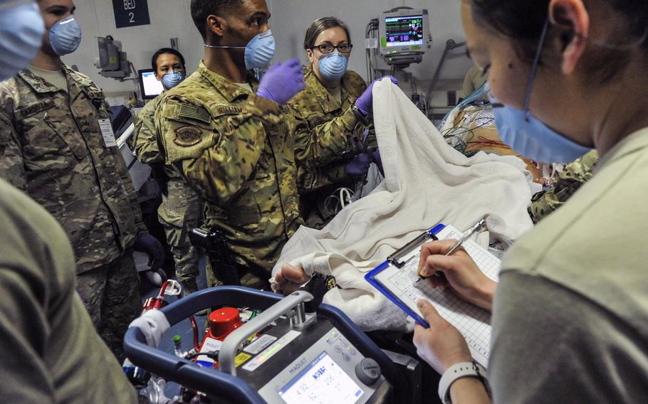 A 455th Expeditionary Medical Group team combines efforts with the Extracorporeal Membrane Oxygenation team to save the life of a NATO ally at the Craig Joint-Theater Hospital at Bagram Air Field, Afghanistan, on Feb. 18, 2016. The patient was airlifted to Landstuhl Regional Medical Center, Germany, where he will receive 7 to 14 days of additional ECMO treatment.