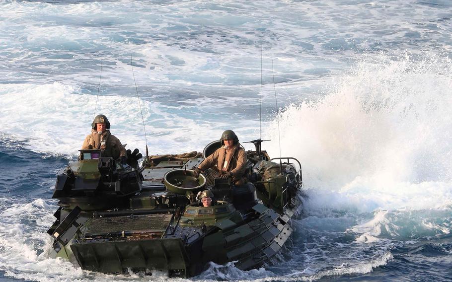 U.S. Marines assigned to the 31st Marine Expeditionary Unit maneuver an assault amphibious vehicle toward the USS Ashland from the shore of Thailand, on Feb. 21, 2016.