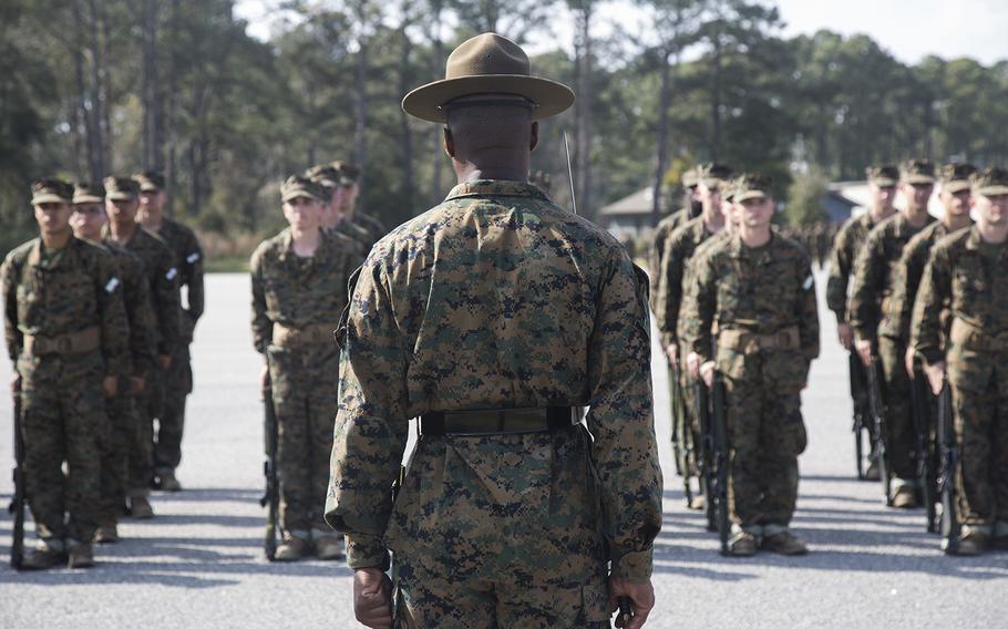 Sgt. Darryl Veal, drill instructor, conducts close-order drill at the 3rd Battalion parade deck at Marine Corps Recruit Depot Parris Island, S.C., on Feb. 24, 2016.