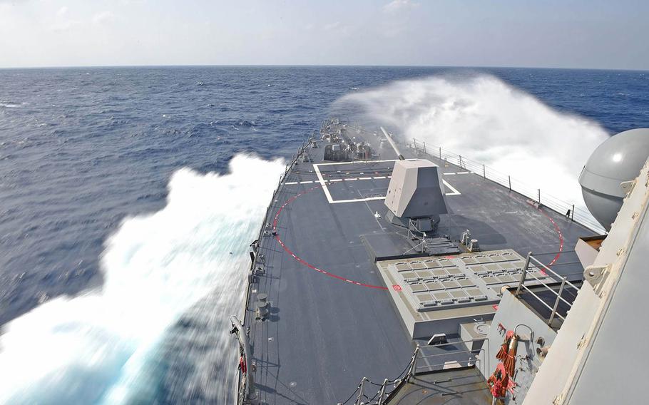 The guided-missile destroyer USS Stockdale operates at full throttle during shouldering exercises on Feb. 21, 2016.
