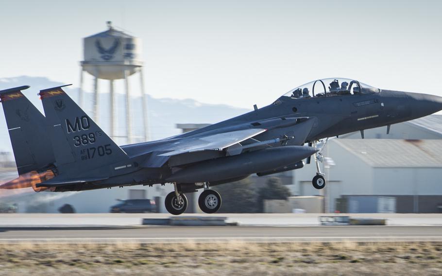 An F-15E Strike Eagle takes off on the flightline at Mountain Home Air Force Base, Idaho, on Feb. 23, 2016.