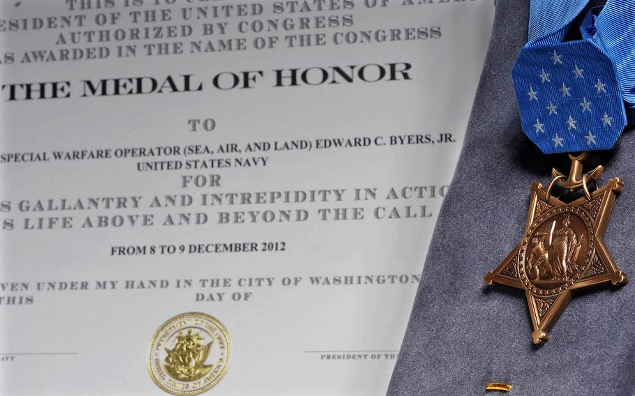 The Medal of Honor citation for Navy SEAL Senior Chief Petty Officer Edward C. Byers Jr., is seen on Feb. 18, 2016.
