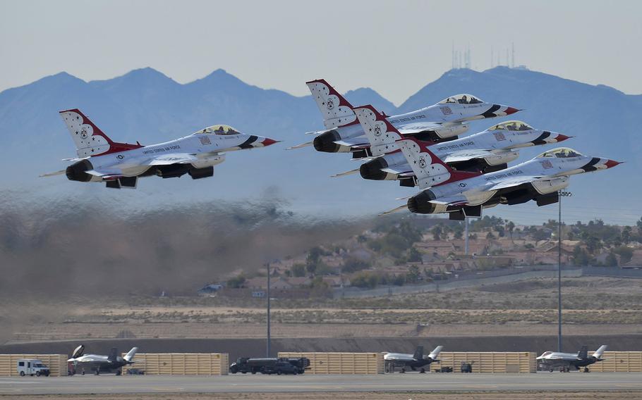 Thunderbirds pilots take off from the runway during the Commander of Air Combat Command approval demonstration at  Nellis Air Force Base, Nev., March 1, 2016. The COMACC approval demonstration is a private showing of the Thunderbirds demonstration focused on safety, precision and execution of the team.