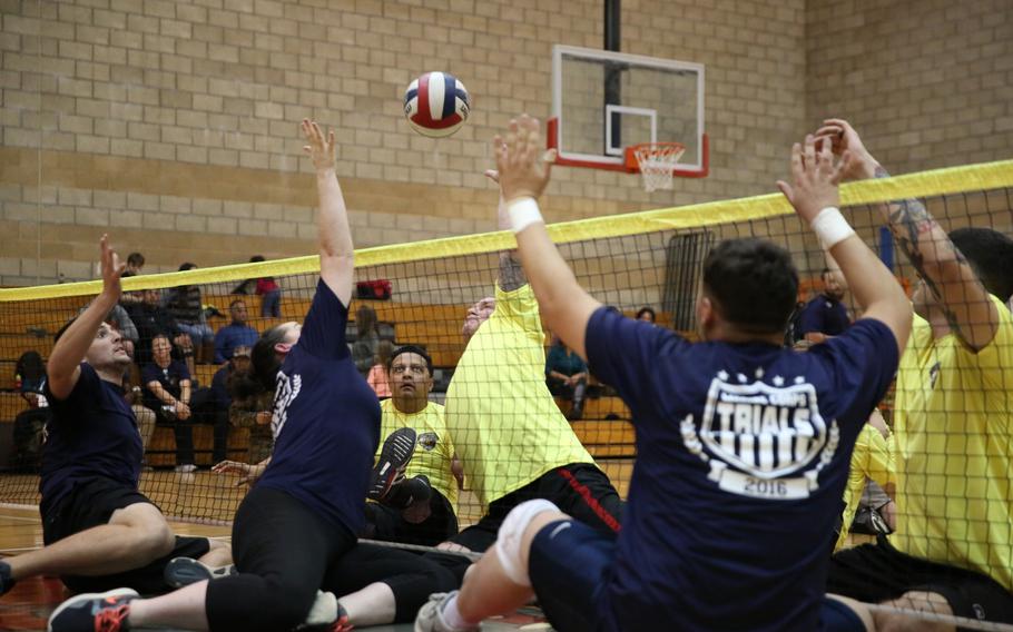 Marines with the Wounded Warrior Regiment compete for gold during the seated volleyball competition at the Marine Corps Trials aboard Marine Corps Base Camp Pendleton, Calif., on March 7, 2016.