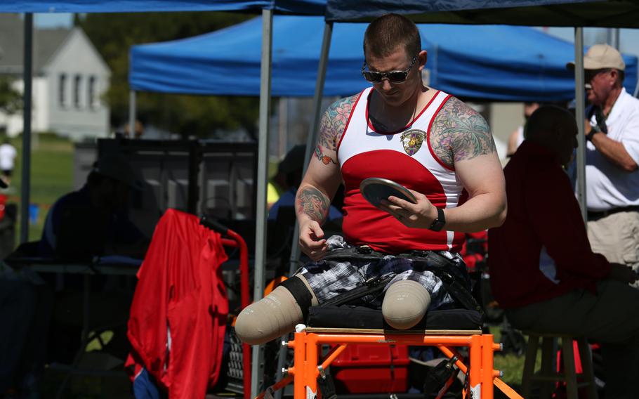 A U.S. Marine with the Wounded Warrior Regiment prepares to launch the discus during the field competition at the Marine Corps Trials aboard Marine Corps Base Camp Pendleton, Calif., on March 9, 2016.