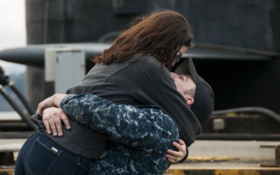 Petty Officer 3rd Class Dustin Cain, a machinist?s mate (Nuclear), assigned to the Blue crew of the USS Maine, is welcomed home to Naval Base Kitsap-Bangor, Wash., by his girlfriend on March 16, 2016.