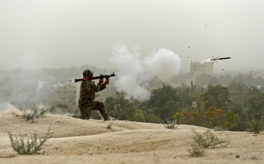 An Afghan soldier fires a rocket-propelled grenade at Taliban positions on the outskirts of Kunduz during mop-up operations in October 2015. There are fears that Afghanistan could be on the brink of its deadliest fighting season this spring, with the Taliban warning of violence and bloodshed in the months to come.