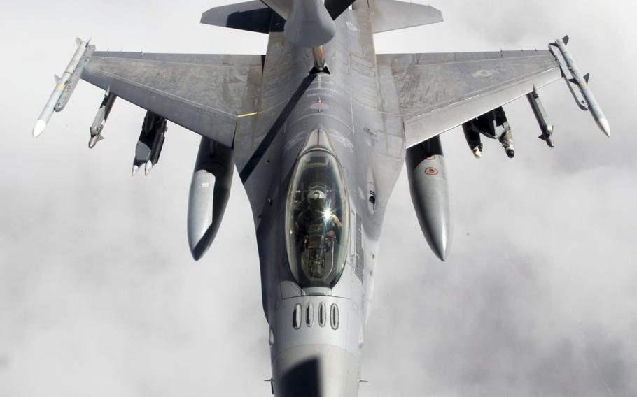 An F-16 fighter supporting air operations against the Islamic State group in Iraq and Syria undergoes a midair refueling from a KC-135 Stratotanker on March 24, 2016.