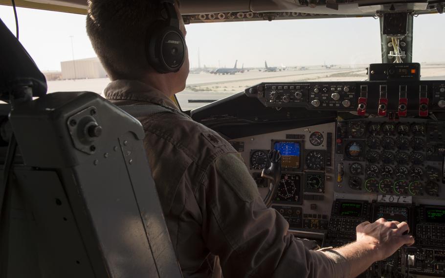 KC-135 Stratotanker aircraft commander and pilot Maj. Joe drives the aircraft during taxiing prior to taking off from Al Udeid Air Base in Qatar for a refueling mission in support of the air campaign against the Islamic State group in Iraq and Syria on March 24, 2016.  Crewmembers could not be identified by their full names for security reasons.