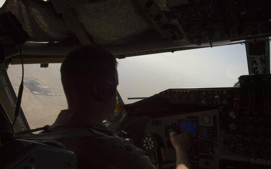 KC-135 Stratotanker aircraft commander and pilot Maj. Joe flies the aircraft shortly after takeoff from Al Udeid Air Base in Qatar for a refueling mission in support of the air campaign against the Islamic State group in Iraq and Syria on March 24, 2016. Crewmembers could not be identified by their full names for security reasons.