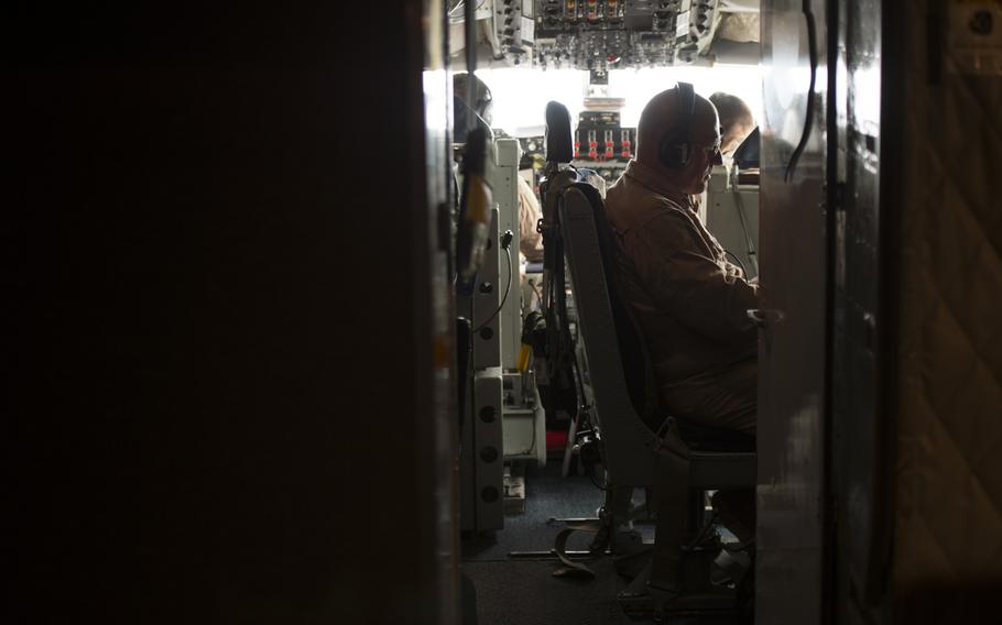 KC-135 Stratotanker Boom Operator Chief Master Sgt. Tim sits in the cockpit between aircraft refuelings on March 24, 2016. Crewmembers could not be identified by their full names for security reasons.