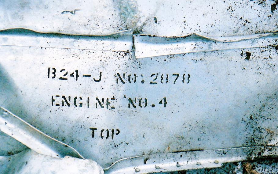 The final resting place of "Hot as Hell," a B-24 Liberator heavy bomber from the 308th Bombardment Group, 425th Squadron that went down Jan. 25, 1944. The crash site, where the wing section and engines are visible, is about 9,400 feet up the outer Himalayas in northeastern India, near China, about a three-day climb from a village called Damroh.