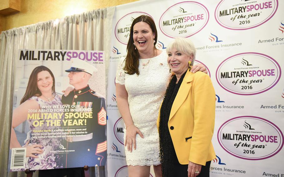 Natasha Harth, left, and Elaine Rogers, President and CEO of USO Metro, are photographed at The 2016 Armed Forces Insurance Military Spouse of the Year Awards luncheon on Thursday, May 5, 2016, at Fort Myer, Va. 
