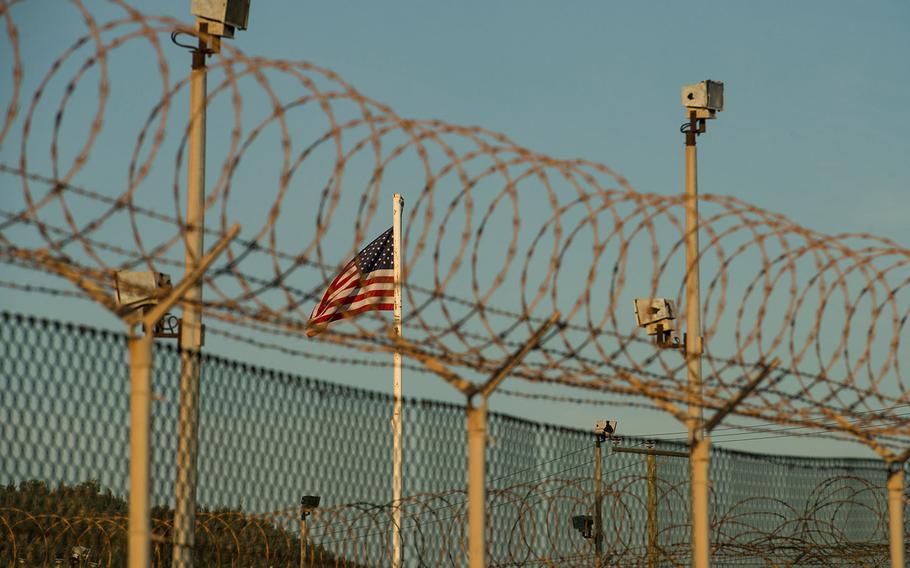 An American flag flies over Camp Delta on April 19, 2015 at Naval Station Guantanamo Bay, Cuba. Detainees were once housed in four facilities at Camp Delta, but today it houses a medical facility, the detainee library and administrative facilities.