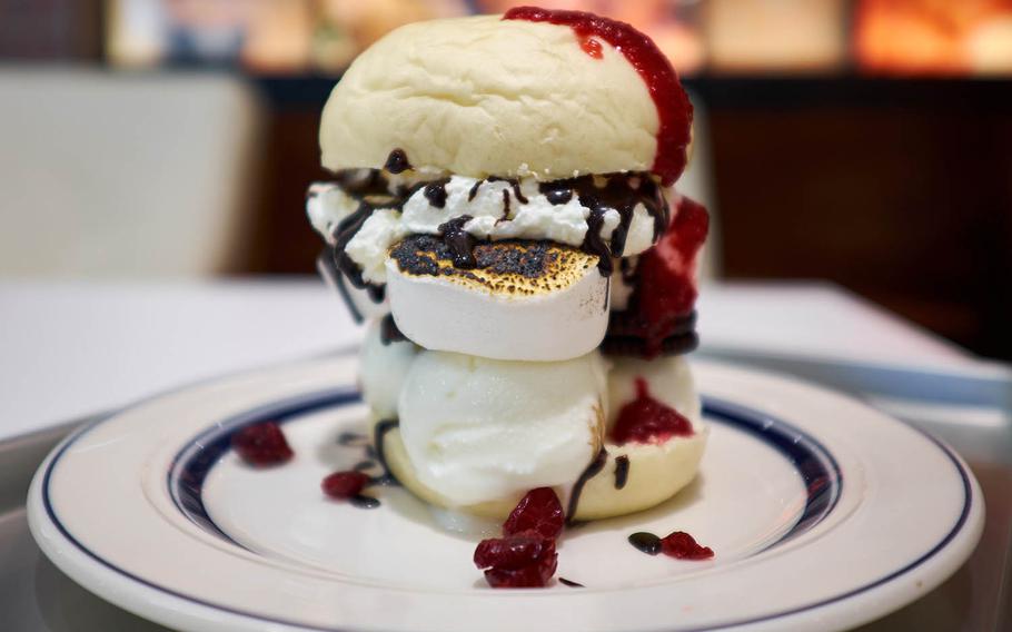 The Marshmallow Mad Burger is J.S. Burgers Cafe "Ghostbusters"-inspired dessert burger. The "burger" is made of toasted marshmallows and chocolate cookies, frozen yogurt and cranberry and chocolate sauces on a white bun.