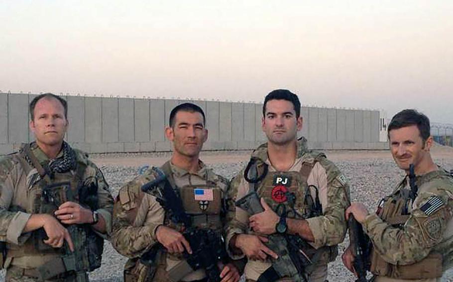 From left: Chief Master Sgt. Paul Barendregt, Maj. Matthew Komatsu, Tech Sgt. Daniel Warren and Master Sgt. Kyle Minshew — shown here at Camp Bastion, Afghanistan — received the Bronze Star with "V" device for valor for their actions in September 2012.