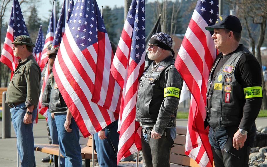 Patriot Guard riders pay respect to the family of Sgt. 1st Class Matthew McClintock during a fallen soldier memorial at Joint Base Lewis-McChord on Feb. 25, 2016. McClintock was killed Jan. 5 in southern Afghanistan. 