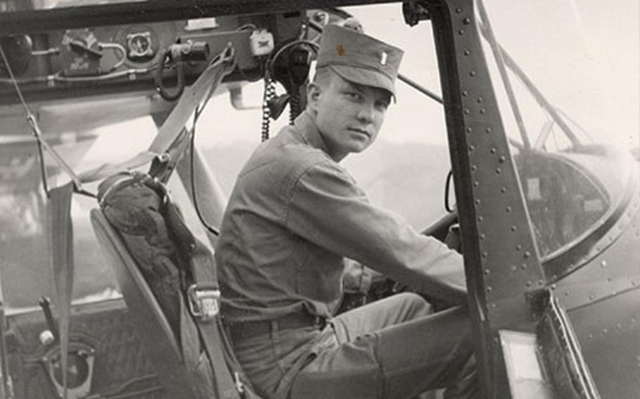 U.S. Army Lt. Charles Kettles at the controls of an Army L-19 aircraft in 1954.