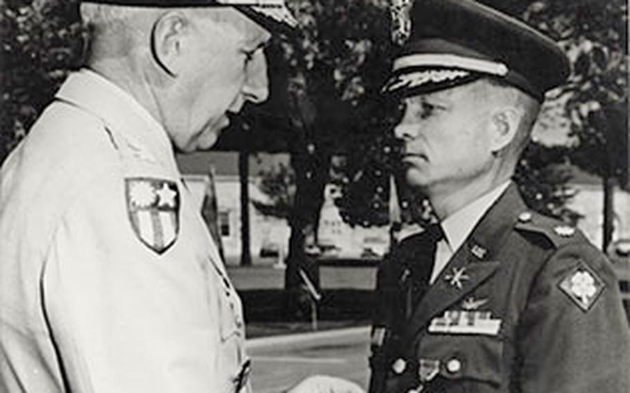 Lt. Gen. L.J. Lincoln awards the Distinguished Service Cross to U.S. Army Maj. Charles Kettles in 1968 at Fort Sam Houston in San Antonio, Texas.