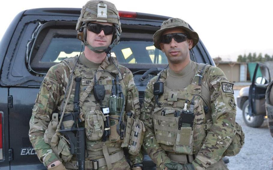 U.S. Army Sgt. Andrew Mahoney, left, of Laingsburg, Mich., with then-1st Lt. Florent Groberg serving on a personal security detail with the 4th Infantry Brigade Combat Team, 4th Infantry Division, during a deployment to Regional Command-East, Afghanistan.