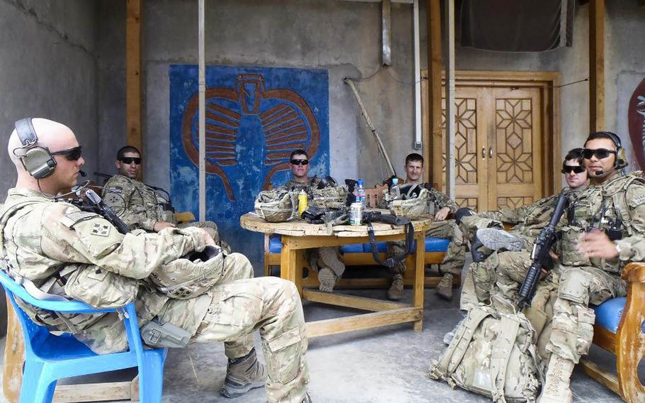 Sgt. Andrew Mahoney, second from right, takes some time with other soldiers of the brigade command group's personal security detail, 4th Infantry Brigade Combat Team, 4th Infantry Division, during his deployment to Regional Command-East, Afghanistan, in 2012.  