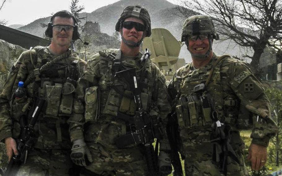 Sgt. Andrew Mahoney, left, Pfc. Benjamin Secor and Command Sgt. Maj. Kevin Griffin -- all with the 4th Infantry Brigade Combat Team, 4th Infantry Division -- on a mission at Regional Command-East, Afghanistan, in 2012. Griffin was killed by a suicide bomber attack in Asadabad, Afghanistan, on Aug. 8, 2012, the same attack in which Mahoney was wounded.