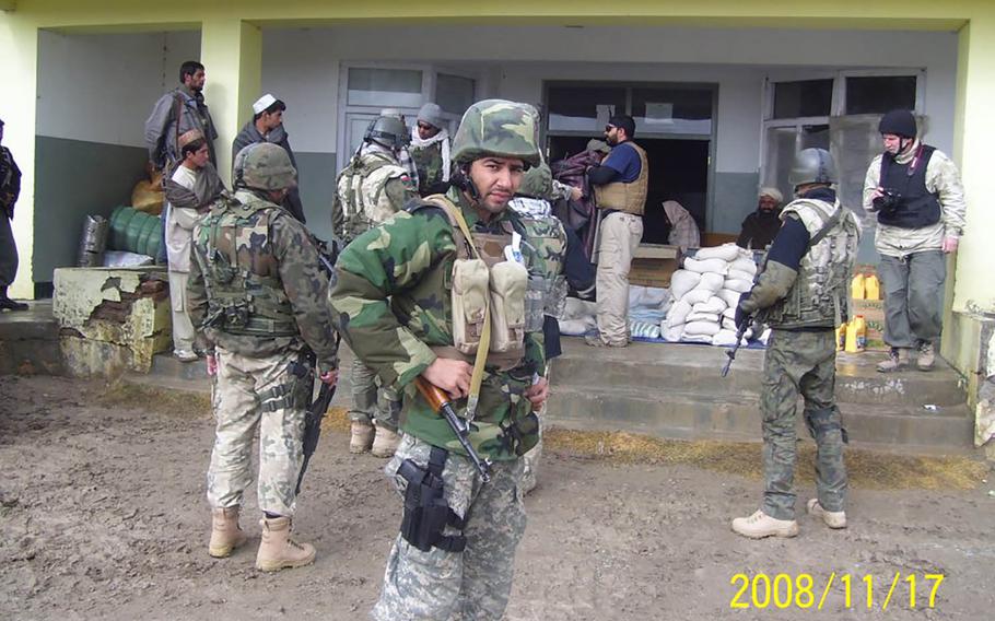 Janis Shinwari on patrol with U.S. forces. Shinwari was an interpreter for the U.S. military in Afghanistan for seven years before immigrating to America in 2013 due to Taliban threats. 