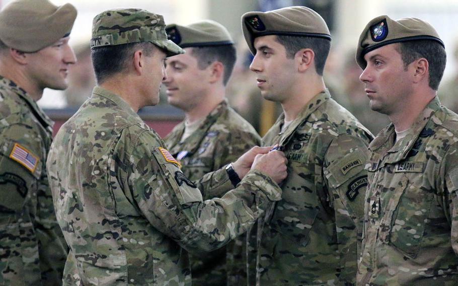 Gen. Daniel B. Allyn, vice chief of staff of the U.S. Army, presents the Silver Star to Sgt. Derek J. Anderson on April 29, 2015, at Hunter Army Airfield, Savannah, Ga. on Dec. 2, 2014, in Nangarhar province, Afghanistan. Anderson, Staff Sgt. James Jones and Sgt. Travis Dunn  directly contributed to the elimination of 25 enemy fighters. 