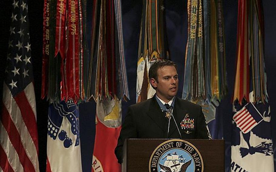 Senior Chief Petty Officer Edward C. Byers Jr. speaks during his Hall of Heroes induction ceremony March 1, 2016, at the Pentagon. The Navy SEAL was awarded the Medal of Honor for actions in Afghanistan in 2012. 