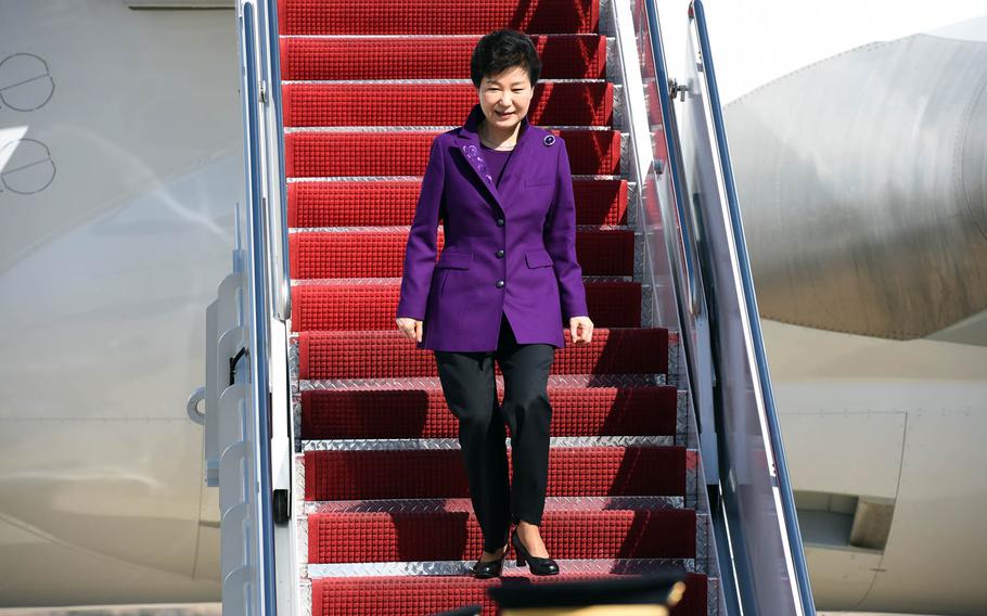 South Korean President Park Geun-hye arrives at the Joint Base Andrews, Md., March 30, 2016. Pressure is mounting for her to resign over a bizarre influence-peddling scandal.