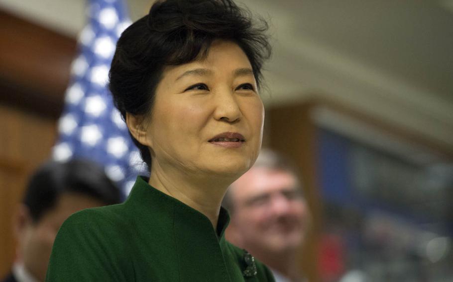 South Korean President Park Geun-hye speaks last year during a visit to the Pentagon. The embattled leader says she will resign if parliament comes up with a plan for the safe transfer of power.
