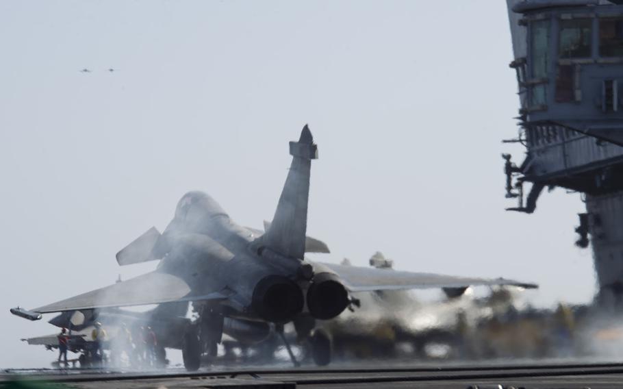 A Dassault Rafale fighter-bomber lands on the French navy aircraft carrier Charles de Gaulle in the eastern Mediterranean on Nov. 25, 2016. The carrier and its air wing are supporting the U.S.-led coalition fighting the Islamic State in Iraq and Syria.