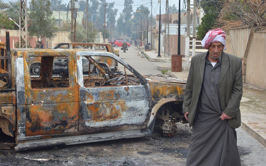 Residents of Mosul's al-Arabi neighborhood said Islamic State fighters forced them to burn their cars during a battle with Iraqi special forces troops on Jan, 20, 2017.