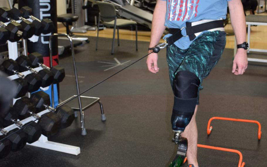 Aubrey Hand, a medically retired senior airman, works out with his prosthesis Feb.10 at the Military Advanced Training Center for amputees at the Walter Reed National Military Medical Center. Hand's left foot was amputated in June, four years after he was injured in a bomb explosion in Afghanistan.