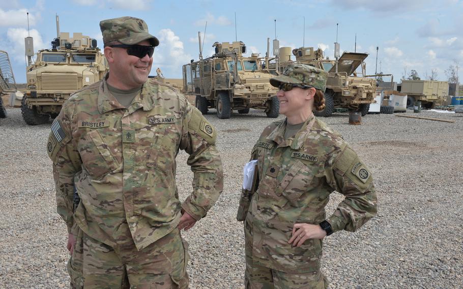 Pictured here sharing a laugh on Friday, March 17, 2017 at Qayara Airfield West are 1st Sgt. Greg Bristley and Lt. Col. Elizabeth Curtis. Curtis, one of a few high-ranking female servicemembers on the base, said that while more opportunities exist now for women in the military, the focus should be on their skills, not their sex.