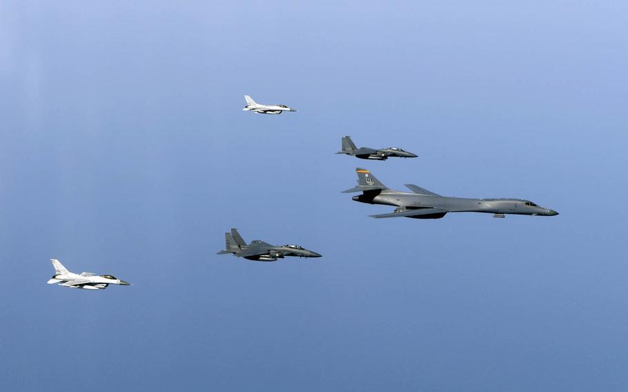 An Air Force B-1B Lancer flies in formation near the Korean peninsula with South Korean F-15Ks and F-16s, Tuesday, March 21, 2017.