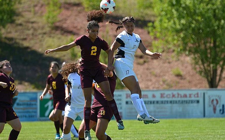 Vilseck's Aliyah Cottrell, left, defends against Ramstein's Faith East in Division I action at the DODEA-Europe soccer championships in Reichenbach, Germany. Ramstein won 3-1.