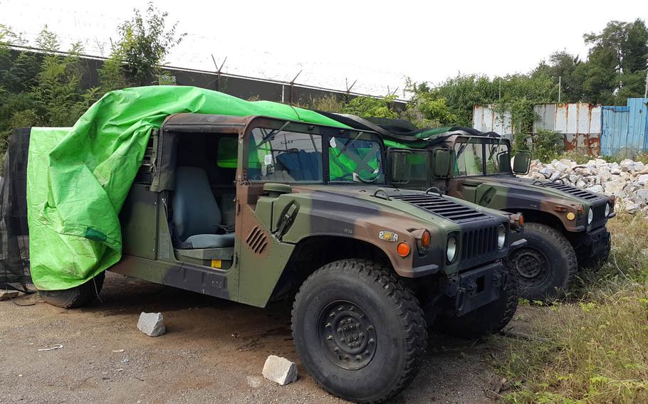 An American soldier and six South Korean civilians have been accused of stealing three Humvees from an unnamed U.S. base in South Korea and trying to sell them.