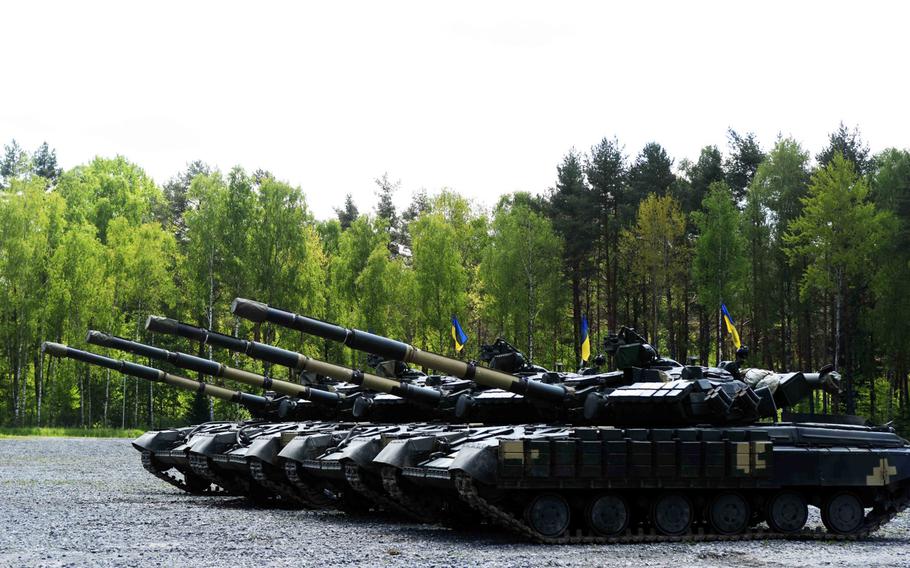 A row of Ukrainian T-64 tanks at Grafenwoehr, Germany, waiting to be transported to Hohenfels, Germany, Tuesday, May 23. The tanks will be part of Exercise Combined Resolve.